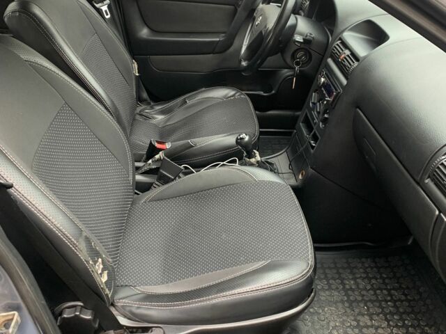 Серый Опель Астра, объемом двигателя 1.4 л и пробегом 224 тыс. км за 2300 $, фото 6 на Automoto.ua