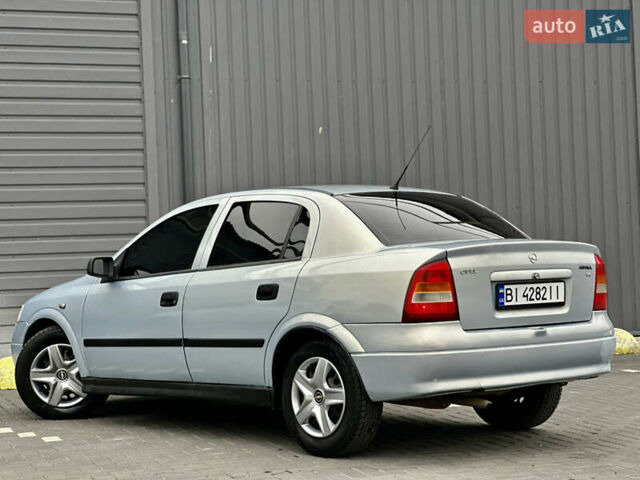 Серый Опель Астра, объемом двигателя 1.39 л и пробегом 240 тыс. км за 2800 $, фото 3 на Automoto.ua