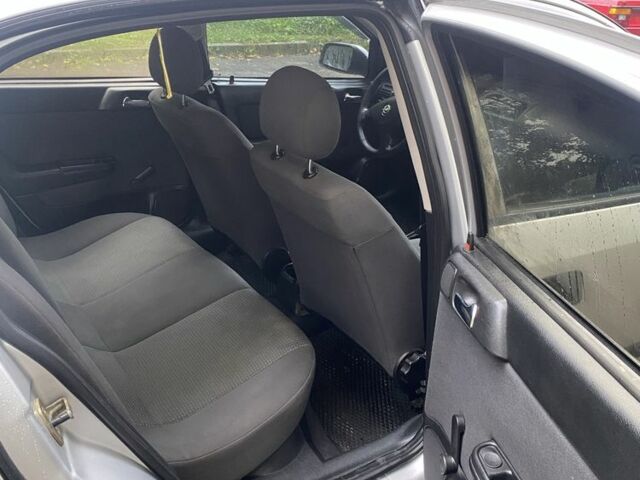 Серый Опель Астра, объемом двигателя 1.4 л и пробегом 348 тыс. км за 2950 $, фото 5 на Automoto.ua