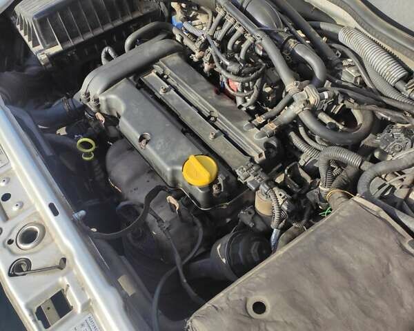 Серый Опель Астра, объемом двигателя 1.39 л и пробегом 242 тыс. км за 3800 $, фото 23 на Automoto.ua