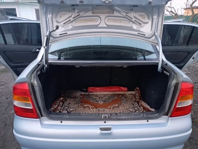 Серый Опель Астра, объемом двигателя 1 л и пробегом 222 тыс. км за 4500 $, фото 3 на Automoto.ua