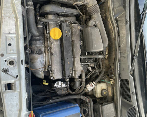 Серый Опель Астра, объемом двигателя 1.6 л и пробегом 290 тыс. км за 2400 $, фото 16 на Automoto.ua