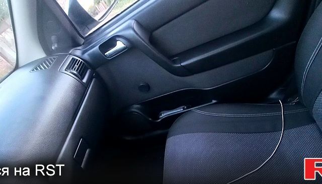 Серый Опель Астра, объемом двигателя 1.4 л и пробегом 215 тыс. км за 3800 $, фото 7 на Automoto.ua