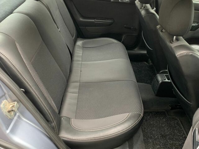 Серый Опель Астра, объемом двигателя 1.4 л и пробегом 224 тыс. км за 2300 $, фото 7 на Automoto.ua