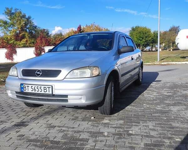 Серый Опель Астра, объемом двигателя 1.39 л и пробегом 242 тыс. км за 3800 $, фото 6 на Automoto.ua