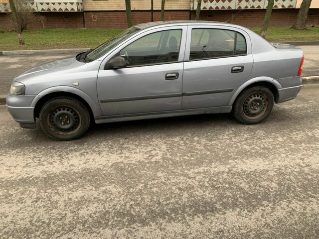 Серый Опель Астра, объемом двигателя 1.4 л и пробегом 224 тыс. км за 2300 $, фото 2 на Automoto.ua