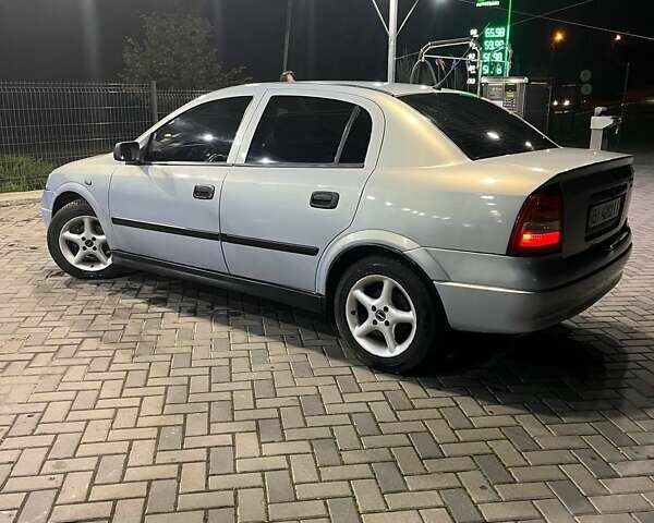 Серый Опель Астра, объемом двигателя 1.4 л и пробегом 146 тыс. км за 3600 $, фото 2 на Automoto.ua