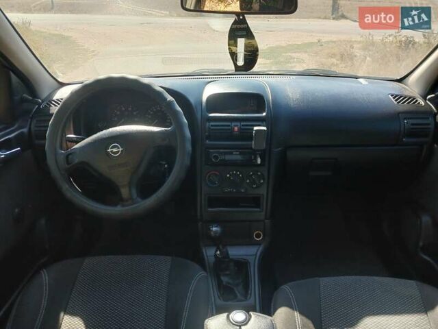 Серый Опель Астра, объемом двигателя 1.39 л и пробегом 260 тыс. км за 2950 $, фото 8 на Automoto.ua