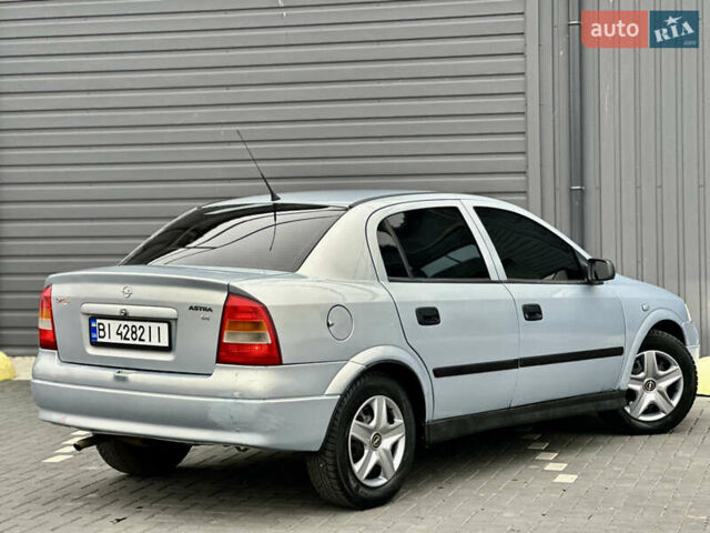 Серый Опель Астра, объемом двигателя 1.39 л и пробегом 240 тыс. км за 2800 $, фото 4 на Automoto.ua