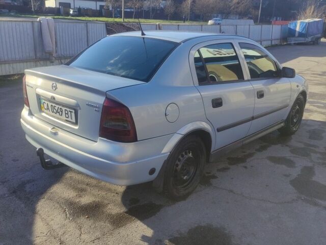 Серый Опель Астра, объемом двигателя 1.6 л и пробегом 260 тыс. км за 3700 $, фото 2 на Automoto.ua