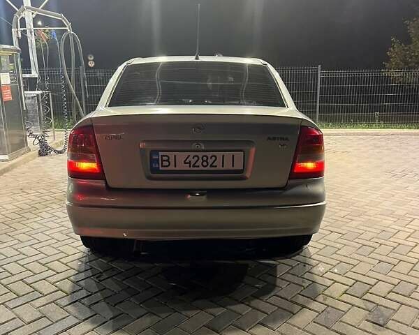 Серый Опель Астра, объемом двигателя 1.4 л и пробегом 146 тыс. км за 3600 $, фото 4 на Automoto.ua