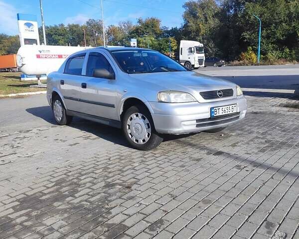 Серый Опель Астра, объемом двигателя 1.39 л и пробегом 242 тыс. км за 3800 $, фото 5 на Automoto.ua