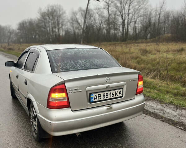 Серый Опель Астра, объемом двигателя 1.39 л и пробегом 223 тыс. км за 3800 $, фото 4 на Automoto.ua