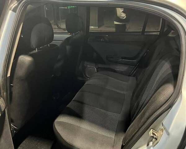 Серый Опель Астра, объемом двигателя 1.4 л и пробегом 146 тыс. км за 3600 $, фото 6 на Automoto.ua