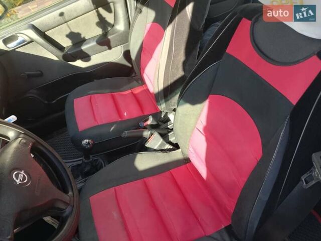 Серый Опель Астра, объемом двигателя 1.4 л и пробегом 147 тыс. км за 3900 $, фото 1 на Automoto.ua