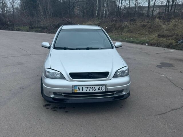 Серый Опель Астра, объемом двигателя 1.4 л и пробегом 300 тыс. км за 5000 $, фото 2 на Automoto.ua