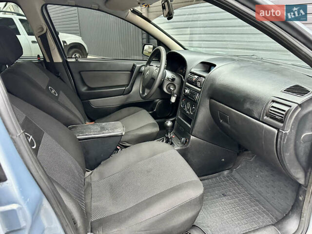 Серый Опель Астра, объемом двигателя 1.39 л и пробегом 240 тыс. км за 2800 $, фото 8 на Automoto.ua