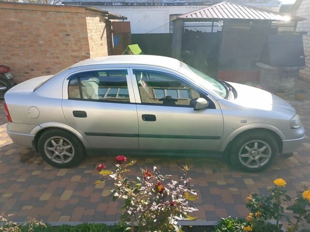 Сірий Опель Астра, об'ємом двигуна 1.4 л та пробігом 148 тис. км за 3900 $, фото 3 на Automoto.ua