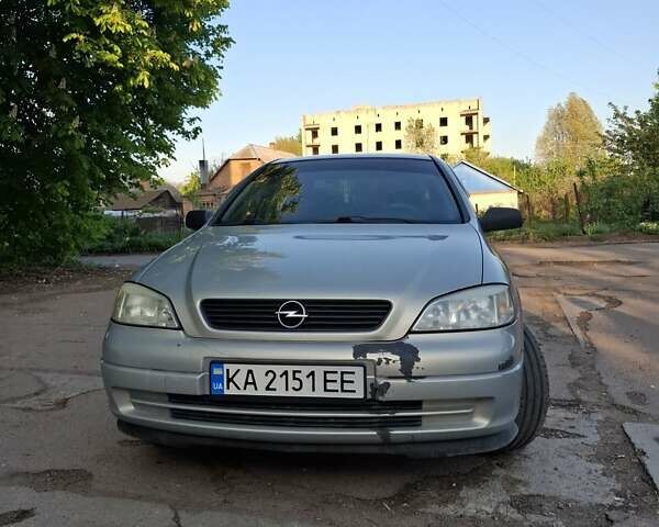 Серый Опель Астра, объемом двигателя 1.4 л и пробегом 216 тыс. км за 3100 $, фото 2 на Automoto.ua