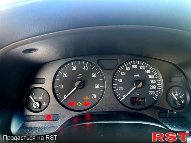 Серый Опель Астра, объемом двигателя 1.4 л и пробегом 212 тыс. км за 3000 $, фото 7 на Automoto.ua