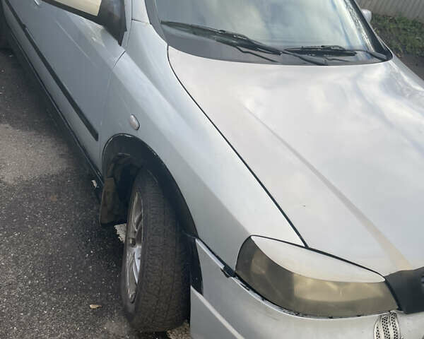 Серый Опель Астра, объемом двигателя 1.6 л и пробегом 290 тыс. км за 2400 $, фото 9 на Automoto.ua