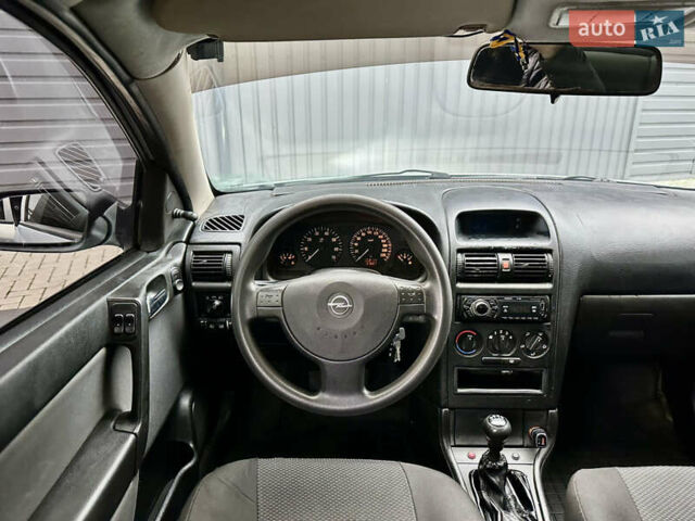 Серый Опель Астра, объемом двигателя 1.39 л и пробегом 240 тыс. км за 2800 $, фото 7 на Automoto.ua