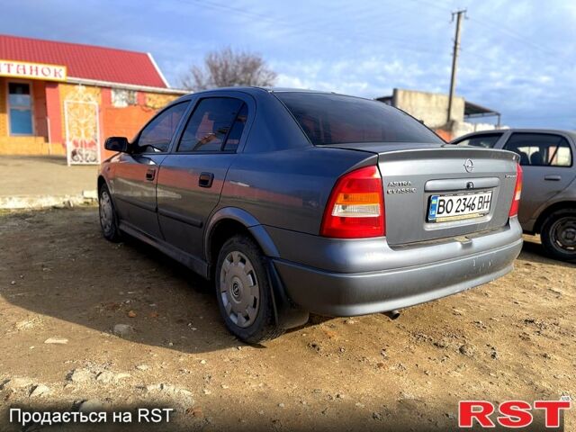 Серый Опель Астра, объемом двигателя 1.4 л и пробегом 212 тыс. км за 3000 $, фото 1 на Automoto.ua