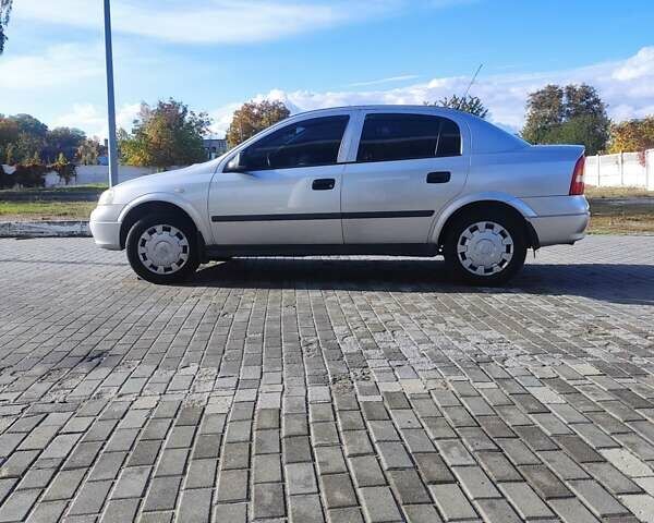 Серый Опель Астра, объемом двигателя 1.39 л и пробегом 242 тыс. км за 3800 $, фото 7 на Automoto.ua