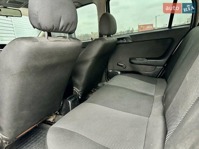 Серый Опель Астра, объемом двигателя 1.39 л и пробегом 240 тыс. км за 2800 $, фото 9 на Automoto.ua