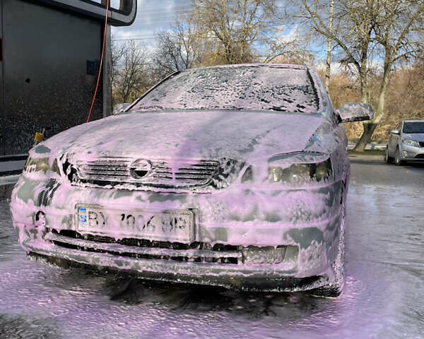 Серый Опель Астра, объемом двигателя 1.6 л и пробегом 290 тыс. км за 2400 $, фото 1 на Automoto.ua