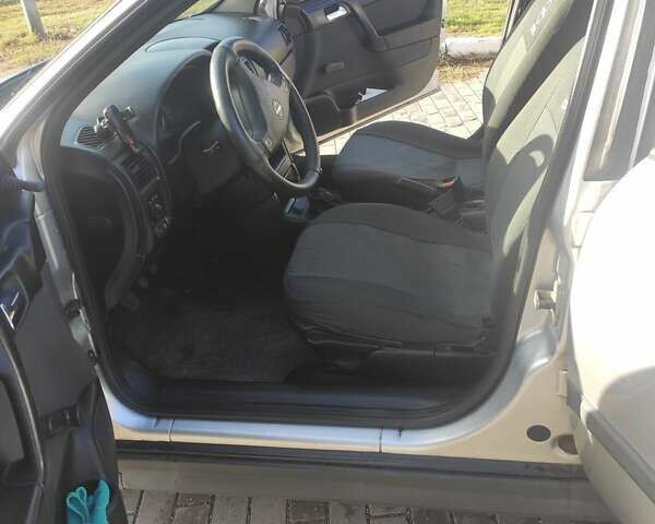 Серый Опель Астра, объемом двигателя 1.39 л и пробегом 242 тыс. км за 3800 $, фото 12 на Automoto.ua