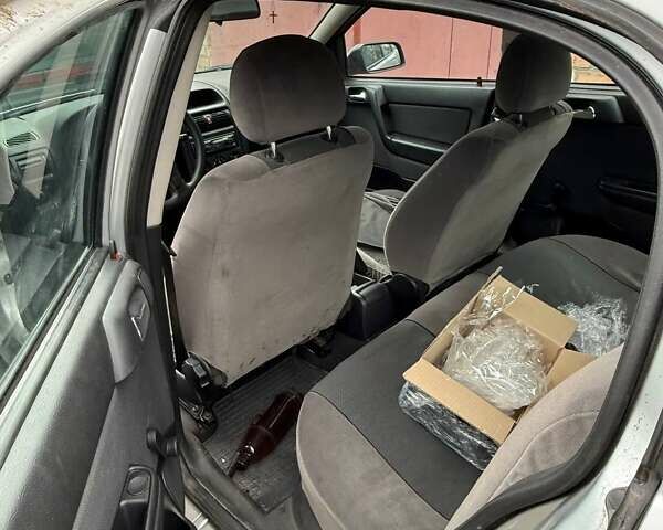 Серый Опель Астра, объемом двигателя 1.4 л и пробегом 120 тыс. км за 3800 $, фото 8 на Automoto.ua