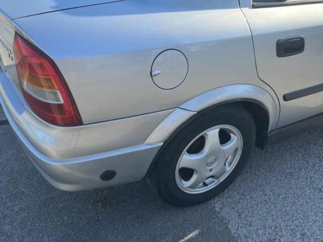 Серый Опель Астра, объемом двигателя 1.4 л и пробегом 270 тыс. км за 3400 $, фото 6 на Automoto.ua