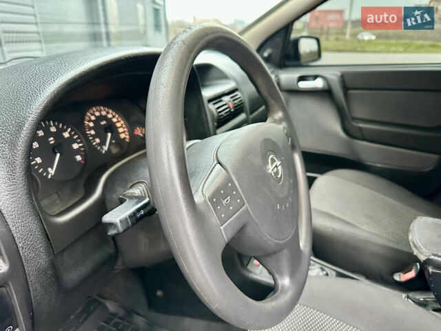 Серый Опель Астра, объемом двигателя 1.39 л и пробегом 240 тыс. км за 2800 $, фото 6 на Automoto.ua