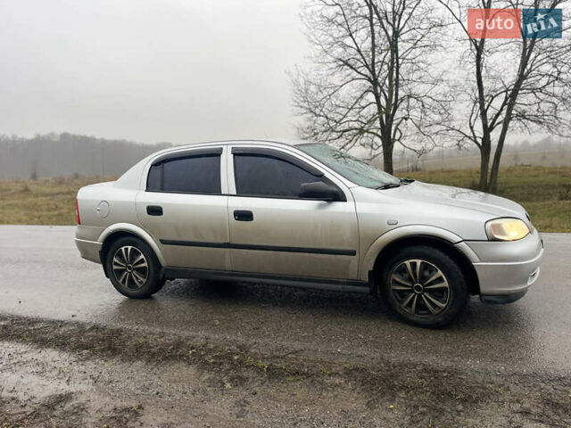 Серый Опель Астра, объемом двигателя 1.39 л и пробегом 223 тыс. км за 3800 $, фото 3 на Automoto.ua