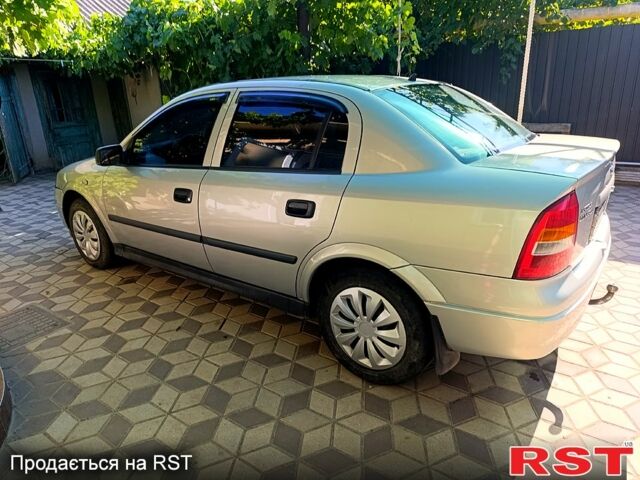 Серый Опель Астра, объемом двигателя 1.4 л и пробегом 270 тыс. км за 3500 $, фото 3 на Automoto.ua