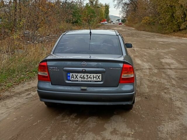Серый Опель Астра, объемом двигателя 1.4 л и пробегом 210 тыс. км за 3200 $, фото 7 на Automoto.ua