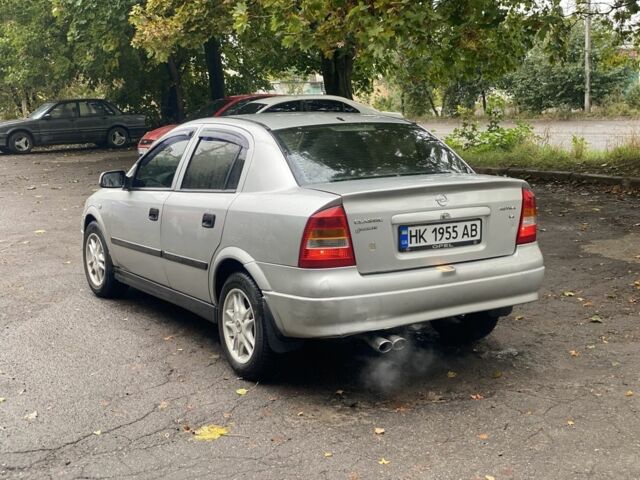 Серый Опель Астра, объемом двигателя 1.4 л и пробегом 348 тыс. км за 2950 $, фото 2 на Automoto.ua