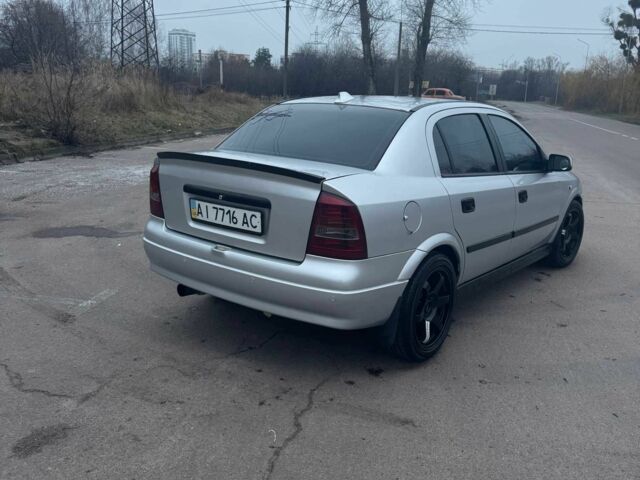 Серый Опель Астра, объемом двигателя 1.4 л и пробегом 300 тыс. км за 5000 $, фото 5 на Automoto.ua