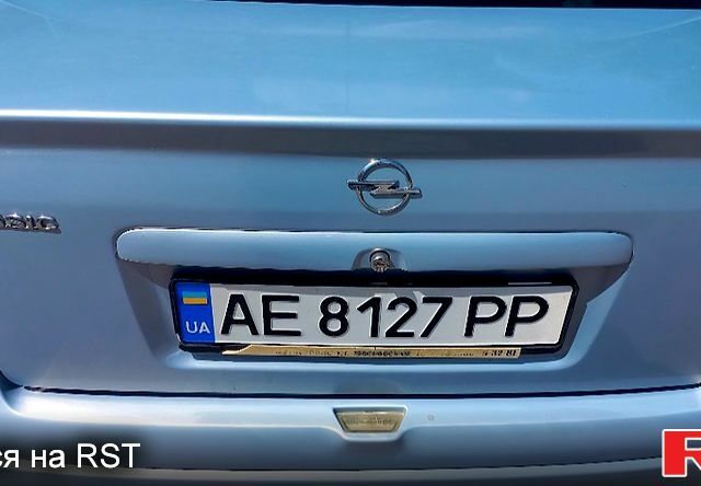 Серый Опель Астра, объемом двигателя 1.4 л и пробегом 215 тыс. км за 3800 $, фото 4 на Automoto.ua