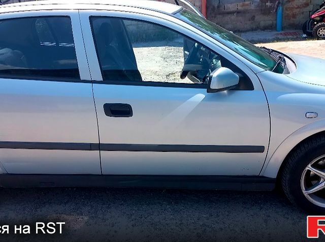 Серый Опель Астра, объемом двигателя 1.4 л и пробегом 215 тыс. км за 3800 $, фото 1 на Automoto.ua