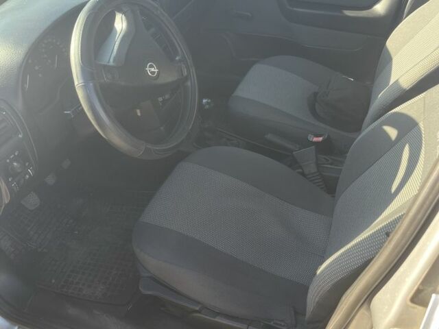 Серый Опель Астра, объемом двигателя 1.4 л и пробегом 270 тыс. км за 3400 $, фото 1 на Automoto.ua