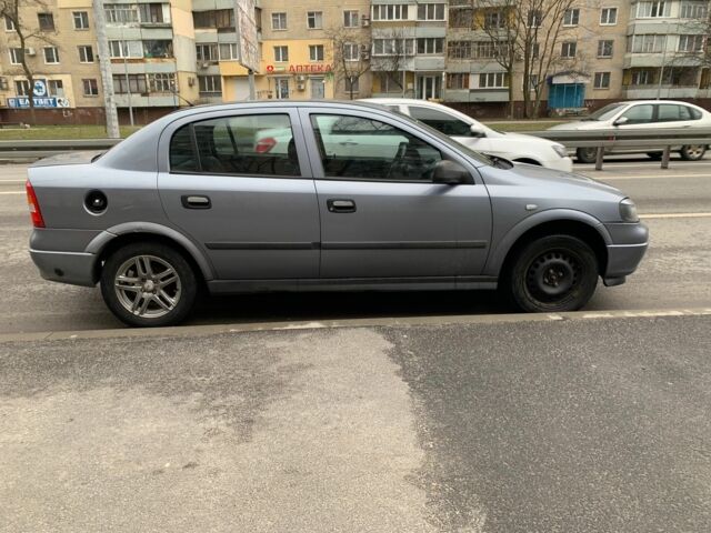 Серый Опель Астра, объемом двигателя 1.4 л и пробегом 224 тыс. км за 2300 $, фото 3 на Automoto.ua
