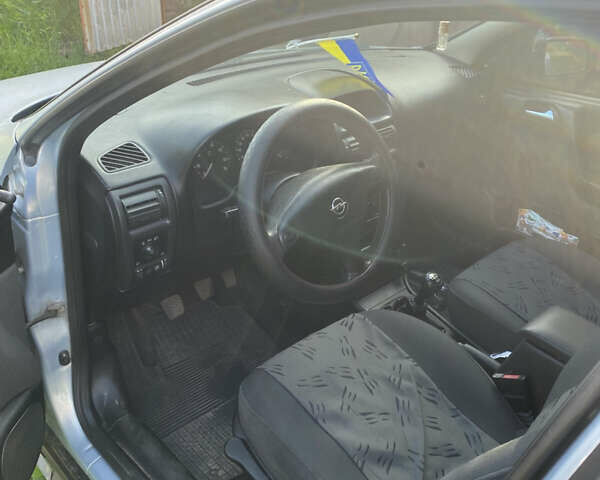 Сірий Опель Астра, об'ємом двигуна 1.39 л та пробігом 163 тис. км за 3900 $, фото 5 на Automoto.ua