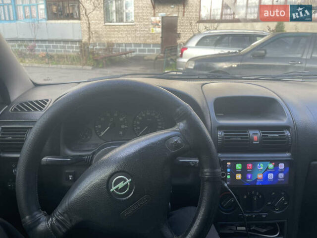 Серый Опель Астра, объемом двигателя 1.6 л и пробегом 290 тыс. км за 2400 $, фото 18 на Automoto.ua