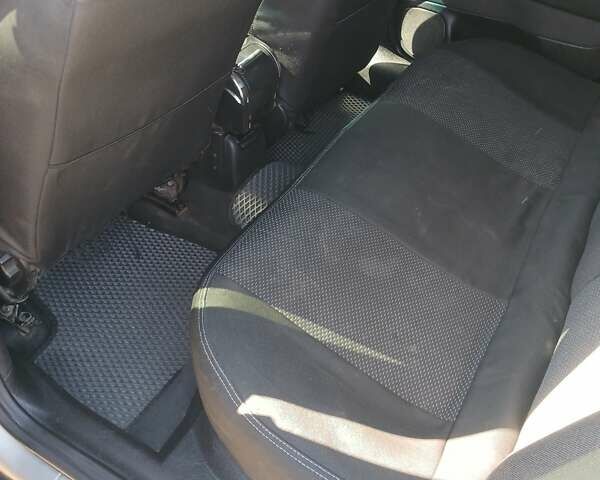 Серый Опель Астра, объемом двигателя 1.39 л и пробегом 260 тыс. км за 2950 $, фото 9 на Automoto.ua