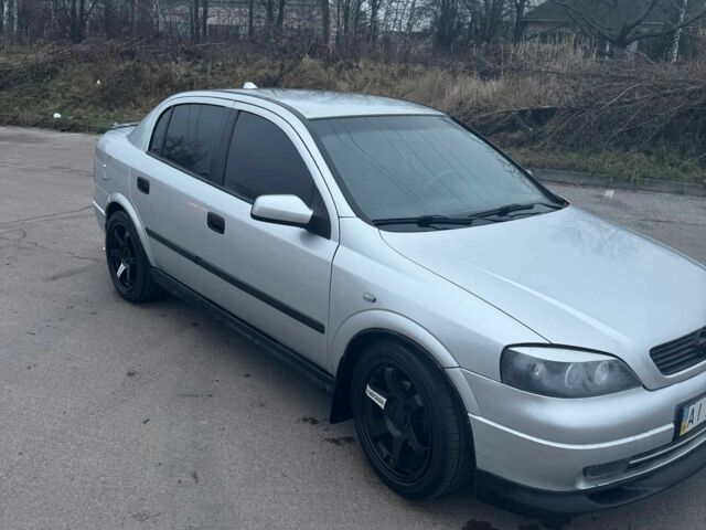 Серый Опель Астра, объемом двигателя 1.4 л и пробегом 300 тыс. км за 5000 $, фото 3 на Automoto.ua