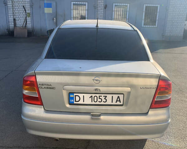 Сірий Опель Астра, об'ємом двигуна 1.39 л та пробігом 252 тис. км за 3850 $, фото 1 на Automoto.ua