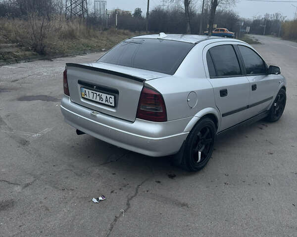 Серый Опель Астра, объемом двигателя 1.4 л и пробегом 300 тыс. км за 5000 $, фото 5 на Automoto.ua