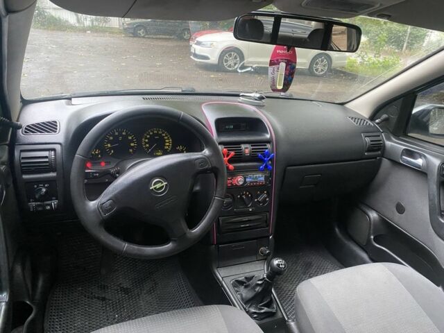 Серый Опель Астра, объемом двигателя 1.4 л и пробегом 348 тыс. км за 2950 $, фото 6 на Automoto.ua